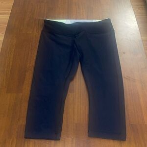 Lululemon Black & Green Patchwork Waist Wunder Under Reversible Crop. Size 12